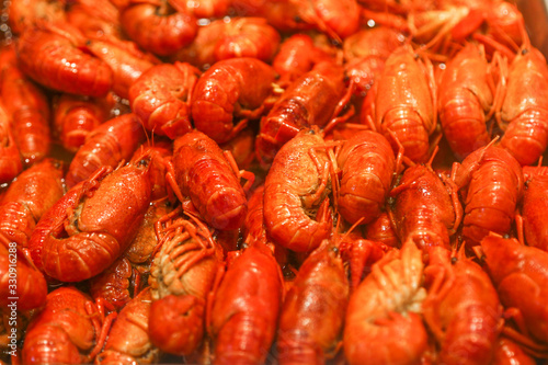 red boiled crayfish as background