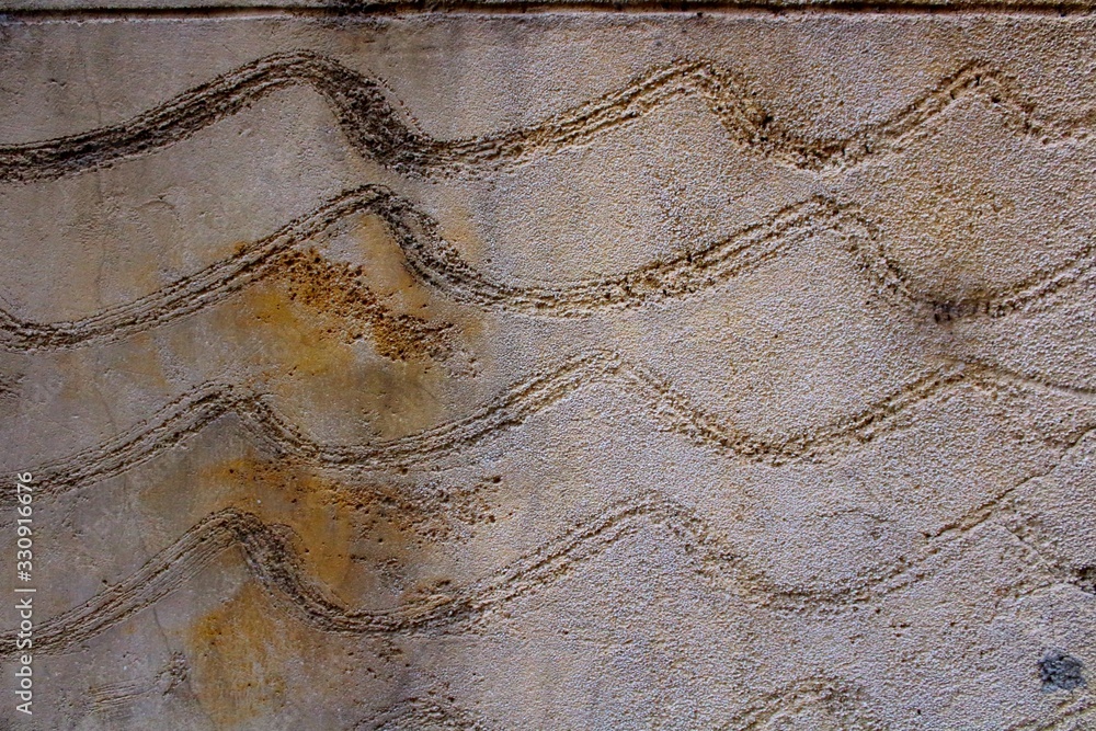 evocative image of old wall texture with wave patterns