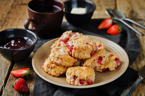 Strawberry scones with jam and butter