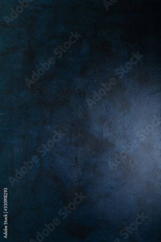 Abstract grunge dark navy blue background, textured. Copyspace.