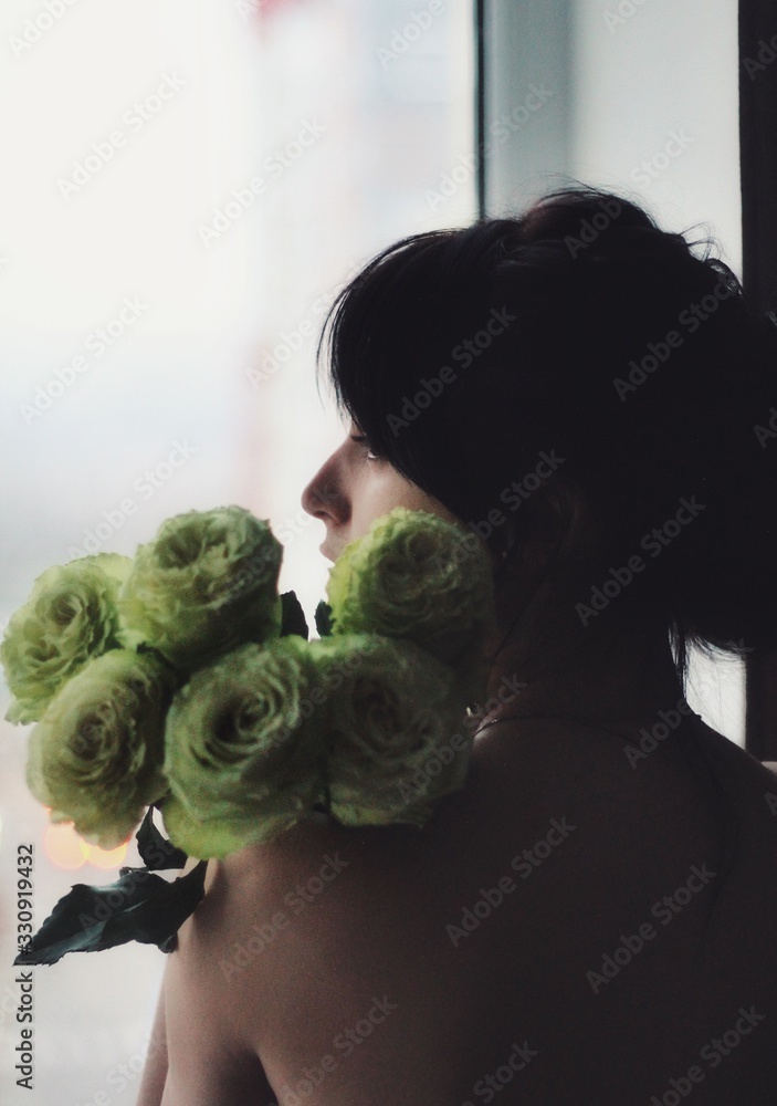 Attractive caucasian brunette girl at home, emotional portrait