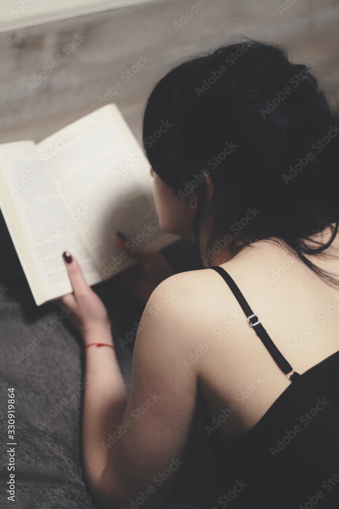 Attractive caucasian brunette girl at home, emotional portrait