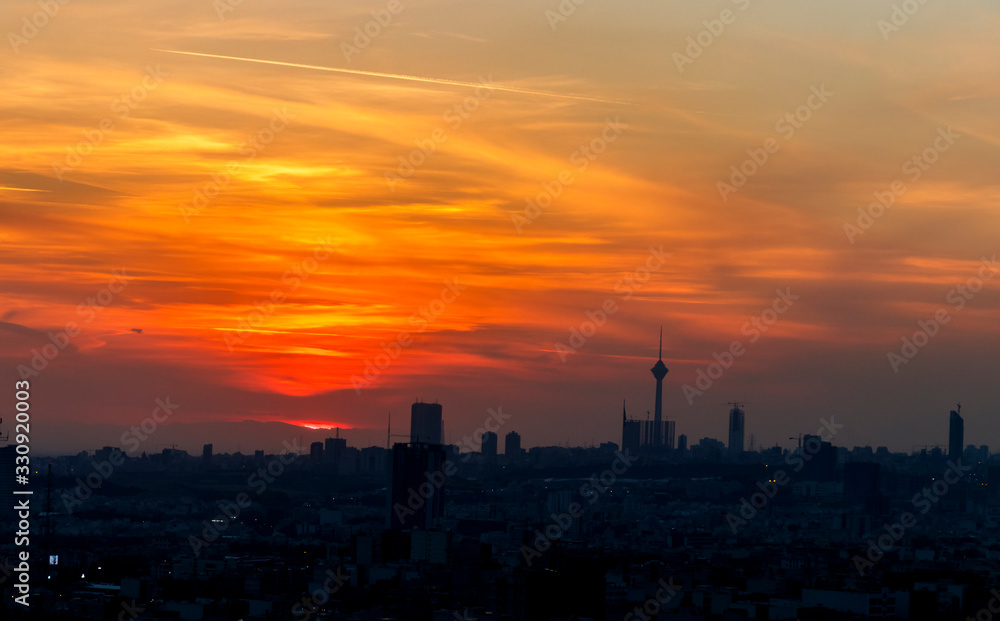 beautiful sunset over Tehran-Iran skyline at an amazing afternoon with unique clouds in the sky.
