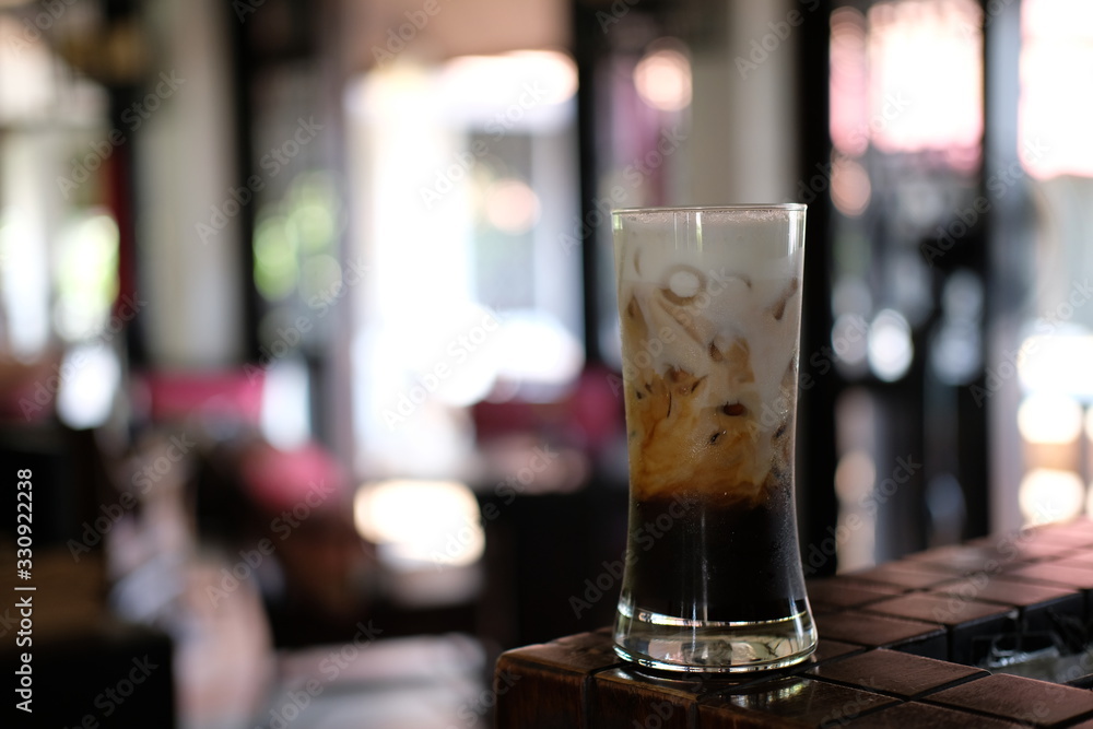 glass of iced coffee on table glass of iced coffee on table