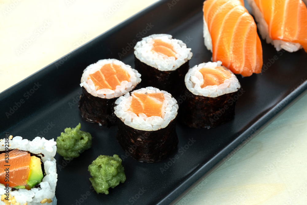 sushi dish on wooden table sushi dish on wooden table