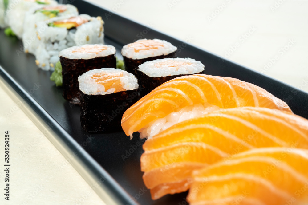 sushi dish on wooden table sushi dish on wooden table