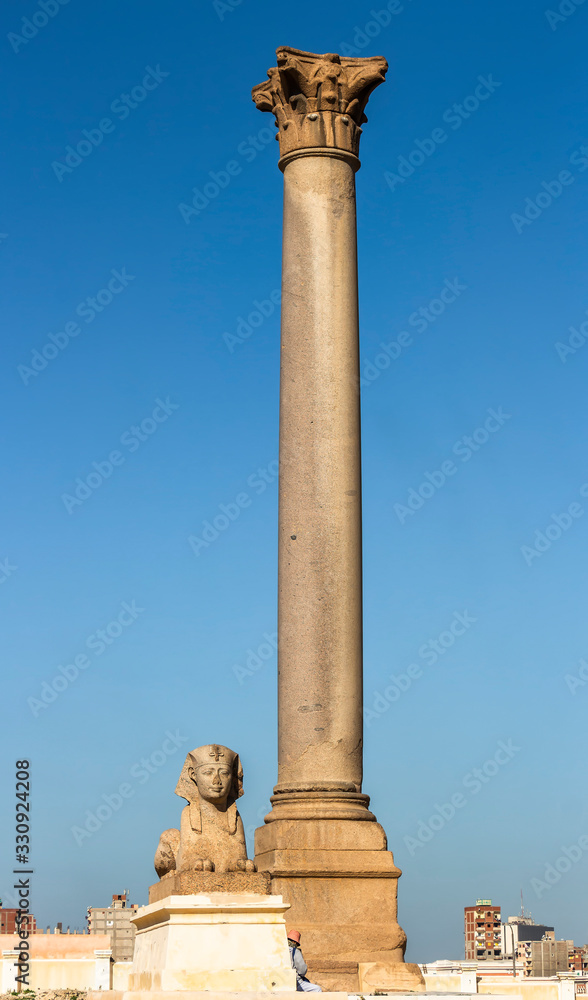 Pompey's Pillar, one of the largest monoliths Corinthian column and sphinxes stands at the eastern side of the temenos of the Serapeum of Alexandria