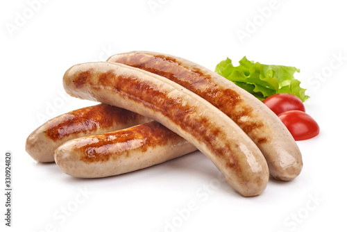 Grilled German pork sausages, Thuringer Rostbratwurst, isolated on white background
