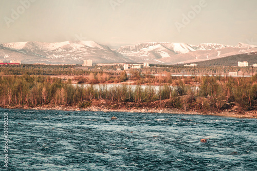 Lake in the mountains. Sunset over Monchegorsk north of Russia photo