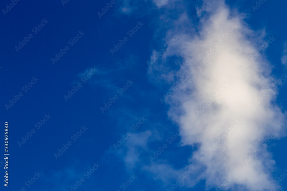 Bright white clouds on blue sky. Beautiful background. Bright white clouds on blue sky. Beautiful background.