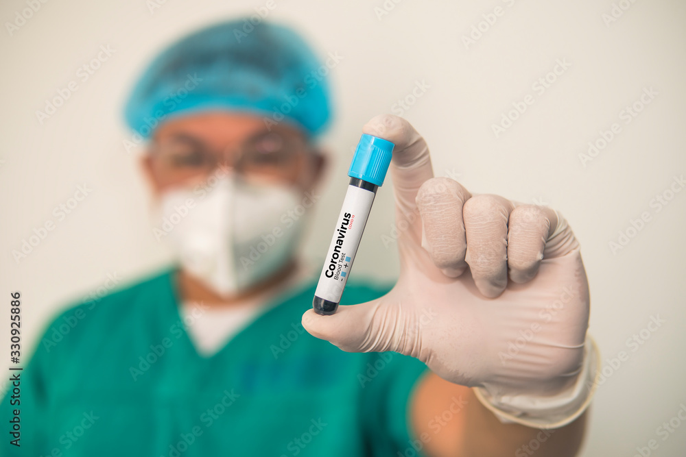 Coronavirus 2019-nCoV Blood Sample. Corona virus outbreaking. Corona Virus in Lab. Scientist hold a tube with Blood Test and Barcode with the Virus Name Coronavirus . New Epidemic Corona Virus Coronavirus 2019-nCoV Blood Sample. Corona virus outbreaking. Corona Virus in Lab. Scientist hold a tube with Blood Test and Barcode with the Virus Name Coronavirus . New Epidemic Corona Virus
