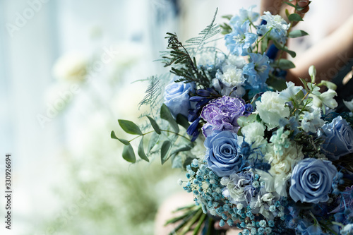 wedding bouquet of blue and purple flowers. photo