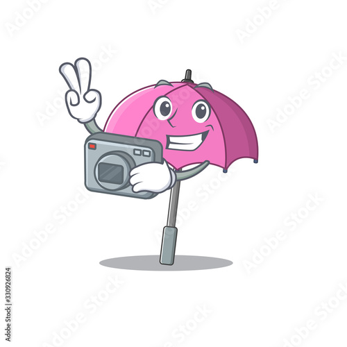 Pink umbrella mascot design as a professional photographer with a camera