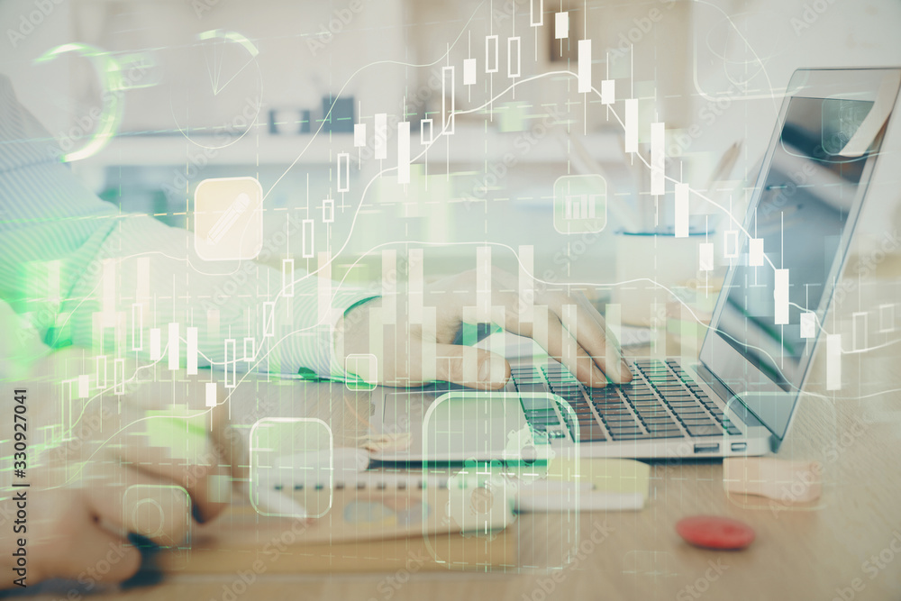 Multi exposure of stock market graph with man working on laptop on background. Concept of financial analysis. Multi exposure of stock market graph with man working on laptop on background. Concept of financial analysis.
