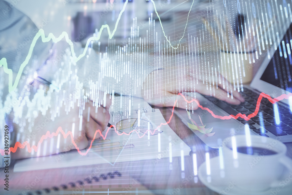 Multi exposure of stock market graph with man working on laptop on background. Concept of financial analysis. Multi exposure of stock market graph with man working on laptop on background. Concept of financial analysis.