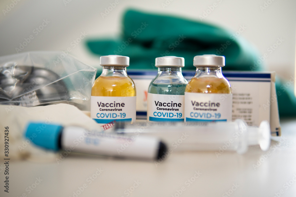 Vaccine and syringe injection. It use for prevention,immunization and treatment from corona virus infection(novel coronavirus disease 2019,COVID-19,nCoV 2019 from Wuhan). Medicine infectious concept. Vaccine and syringe injection. It use for prevention,immunization and treatment from corona virus infection(novel coronavirus disease 2019,COVID-19,nCoV 2019 from Wuhan). Medicine infectious concept.