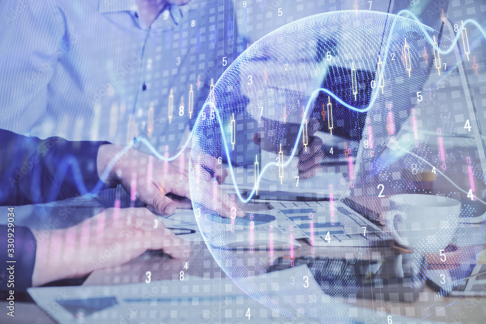 Multi exposure of chart with man typing on computer in office on background. Concept of hard work. Multi exposure of chart with man typing on computer in office on background. Concept of hard work.