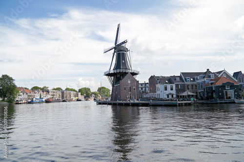 Picturesque landscape with traditional dutch windmill located in Haarlem, The Netherlands © Raquel Pedrosa