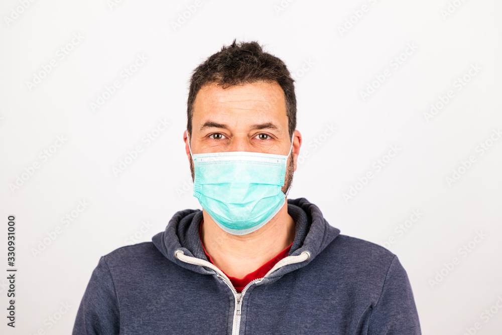 man with a mouthguard isolated against white background man with a mouthguard isolated against white background