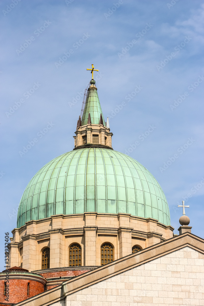 Udine, Italy. Beautiful architecture of catholic church (Parrocchia di San Nicolò Vescovo al Tempio Ossario) in Udine.