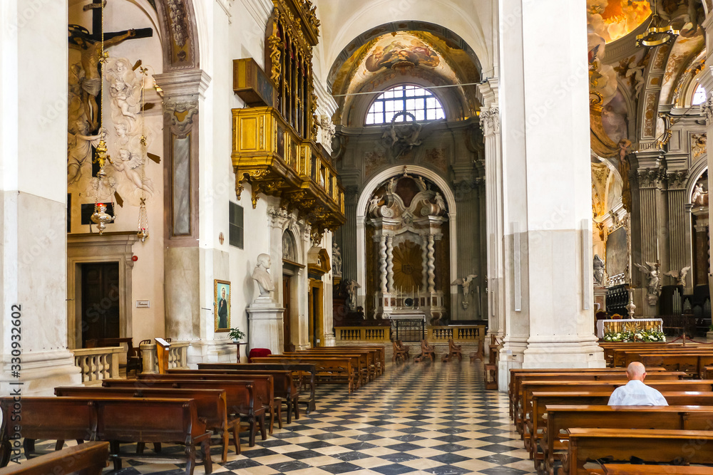 Udine, Italy. Interiors of catholic church (Cathedral of Santa Maria Annunziata) in Udine.