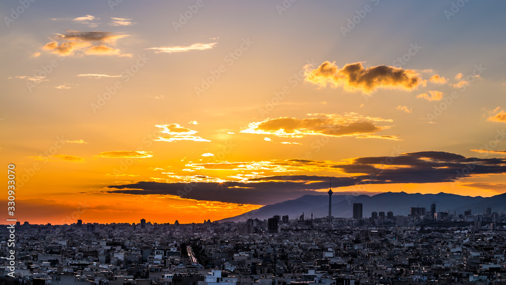 Tehran skyline at the sunset with Milad tower in the frame, colorful