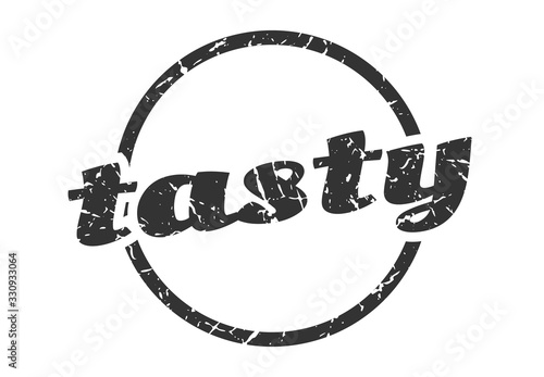tasty sign. tasty round vintage grunge stamp. tasty