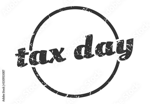 tax day sign. tax day round vintage grunge stamp. tax day