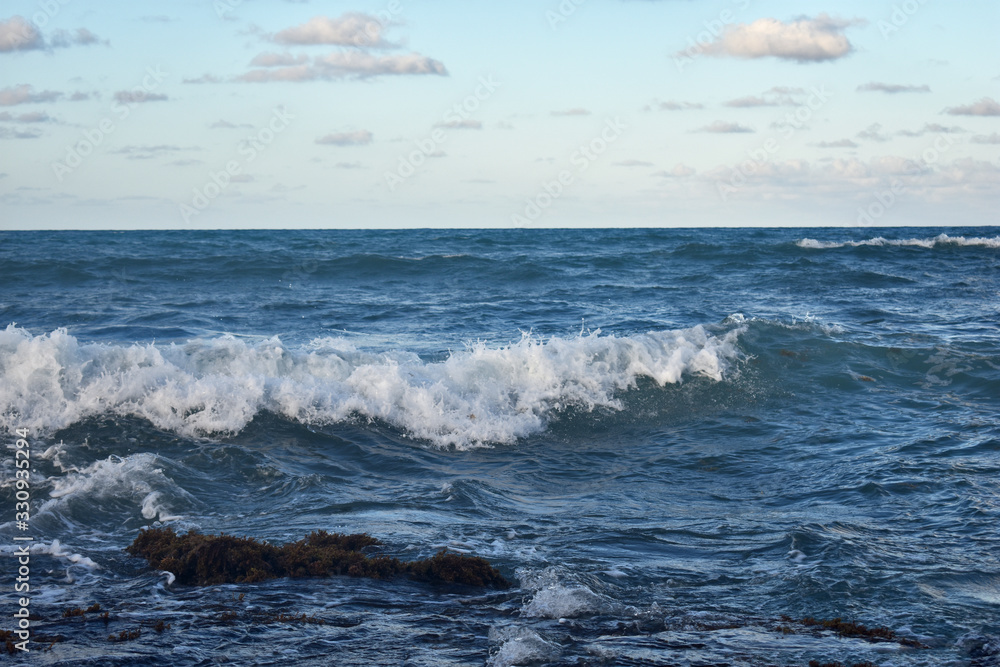 waves break on the shore. Atlantic ocean. Dominican Republic