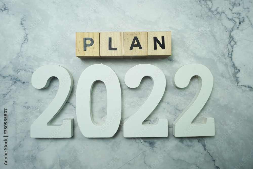 Plan 2022 alphabet letter on marble background Plan 2022 alphabet letter on marble background