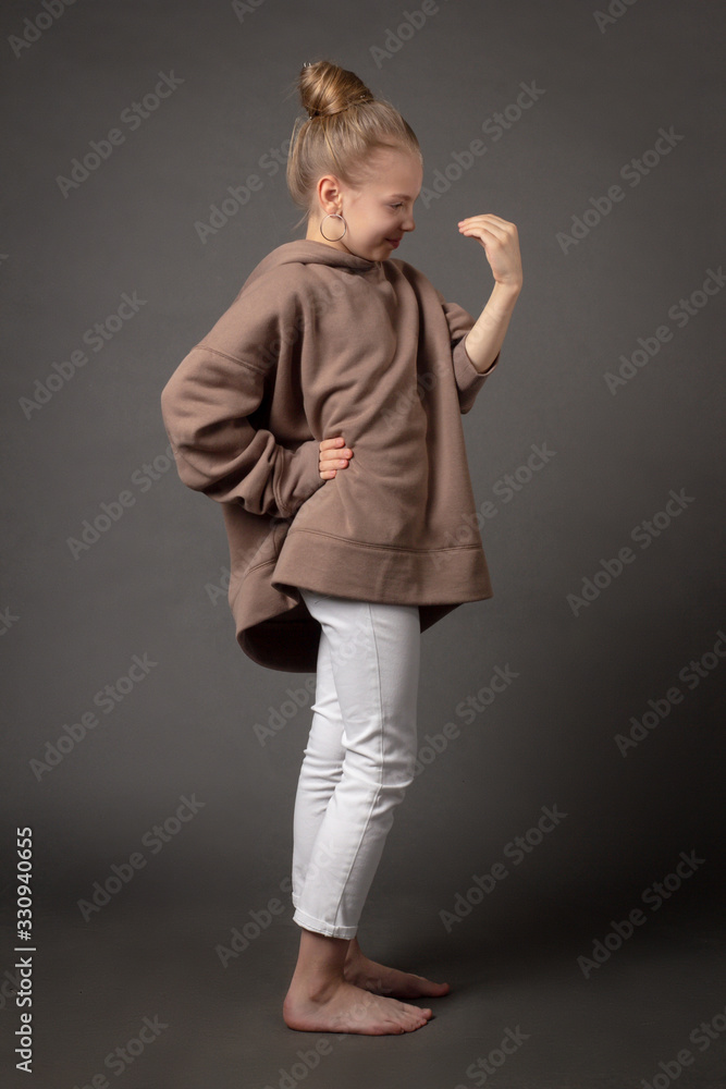 child-girl with long hair gathered in a bun child-girl with long hair gathered in a bun