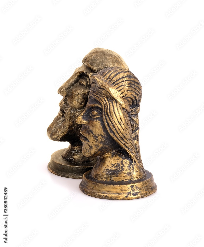 Figurines Scandinavian supreme god Odin (Woden) and his spouse goddess Frigg isolated on white background Figurines Scandinavian supreme god Odin (Woden) and his spouse goddess Frigg isolated on white background