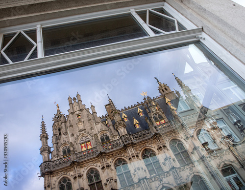 Oudenaarde East Flanders Belgium. Architecture City hall. Reflection in window. photo