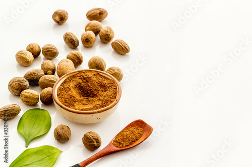 Nutmeg - still life with asian spices - on white background copy space