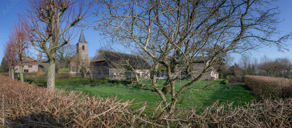 Panorama Horebeke East Flanders Belgium. Church and farmhouse atGeuzenhoek Panorama Horebeke East Flanders Belgium. Church and farmhouse atGeuzenhoek
