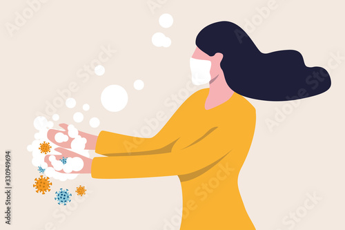 Washing hands to sanitize and disinfect COVID-19 Coronavirus pathogens from your hands concept, woman washing hands with alcohol gel or soap with bubbles and COVID-19 virus pathogen on her hands.