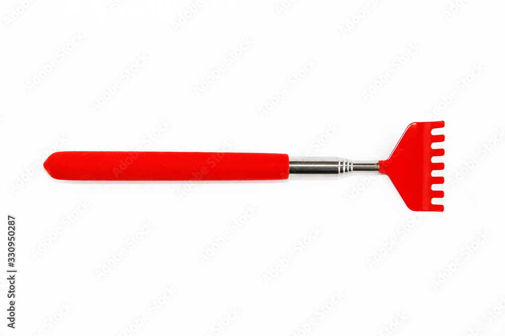 metal red rake tool on a white background
