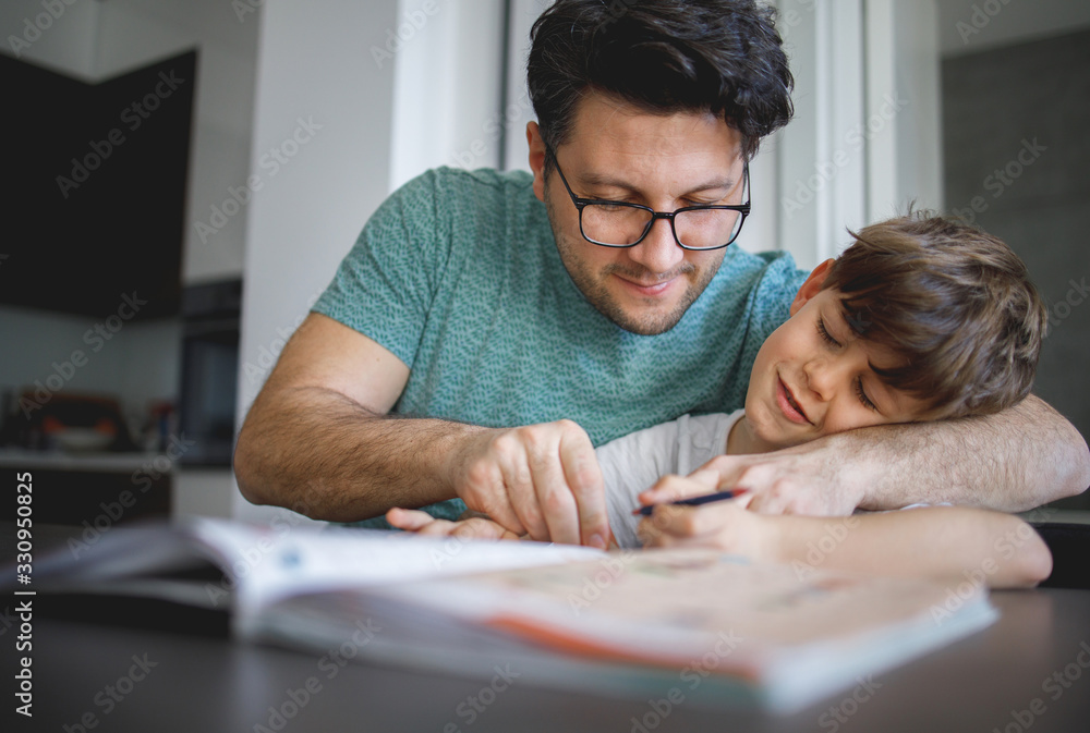 Father and Son doing homework Together Father and Son doing homework Together