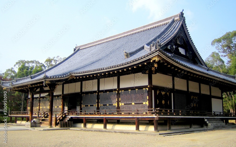 Autumn nature, Ninna-ji temple gardens in Kyoto, Japan. Located in western Kyoto and founded in AD 888, Ninna-ji is part of the Historic Monuments of Ancient Kyoto, a UNESCO World Heritage Site.