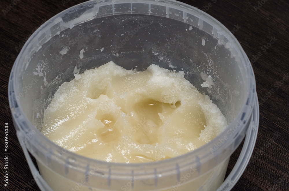 honey in a plastic bucket honey in a plastic bucket