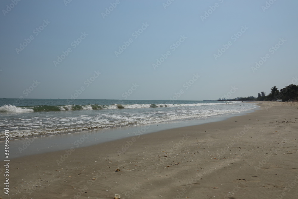 Empty thai beach with a quiet sea Empty thai beach with a quiet sea