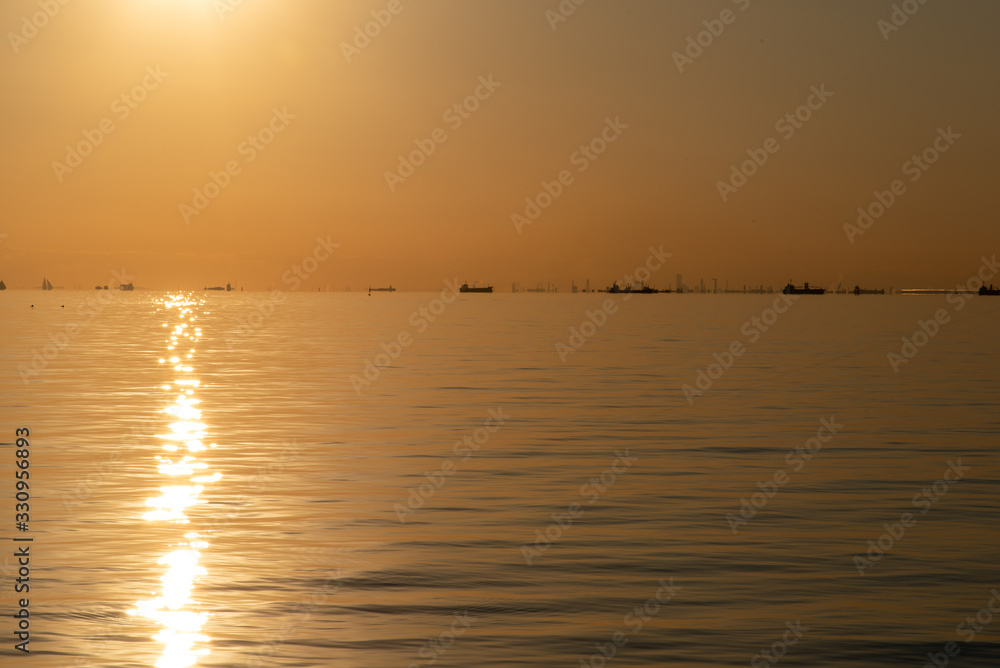 Fototapeta premium Sunset over the sea. Tokyo Bay.