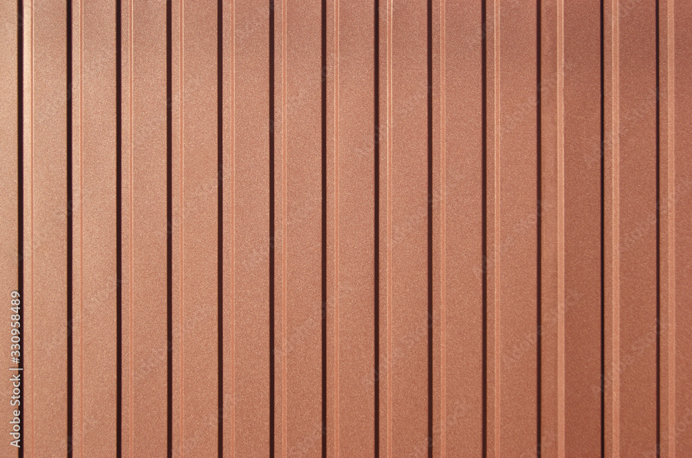 Brown background of metal wall siding, cladding. Brown background of metal wall siding, cladding.