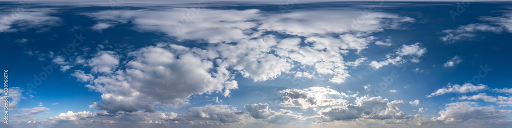 Seamless hdri panorama 360 degrees angle view blue sky with beautiful fluffy cumulus clouds with zenith for use in 3d graphics or game development as sky dome or edit drone shot Seamless hdri panorama 360 degrees angle view blue sky with beautiful fluffy cumulus clouds with zenith for use in 3d graphics or game development as sky dome or edit drone shot