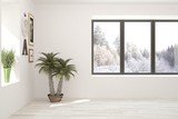 Mock up of empty living room in white color with winter landscape in window. Scandinavian interior design. 3D illustration