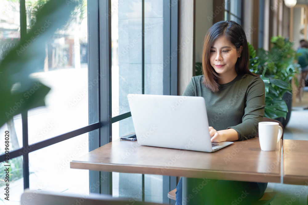 women working with laptop in cefe, coworking spaces, work at home. women working with laptop in cefe, coworking spaces, work at home.