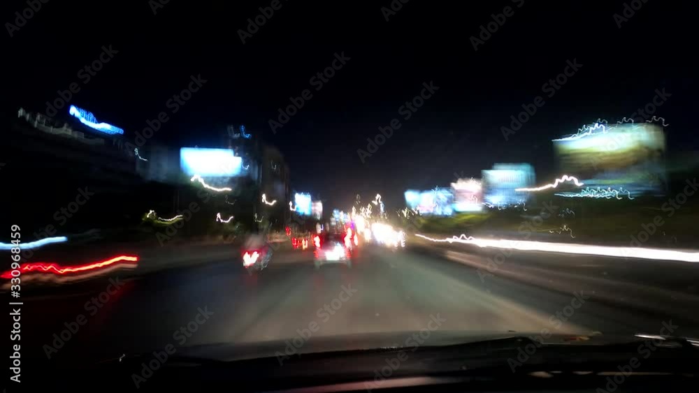 4K Time lapse of driving in a car in the city at night time. POV angle Hyper lapse on a busy highway. Mumbai, India. GP10577. 4K Time lapse of driving in a car in the city at night time. POV angle Hyper lapse on a busy highway. Mumbai, India. GP10577.