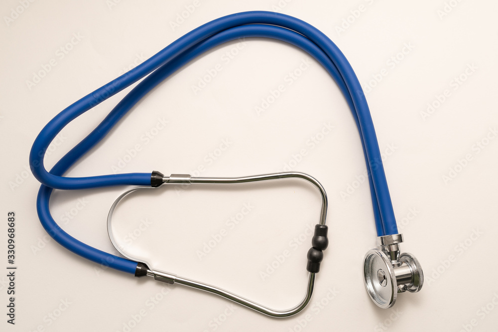 Stethoscope on white background, top view. Medical instrument Stethoscope on white background, top view. Medical instrument