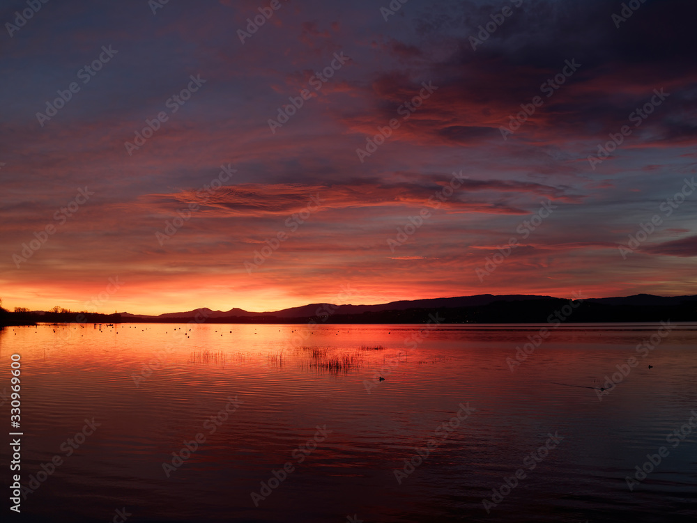 Beautiful sunset at the Murten Lake in Switzerland.
