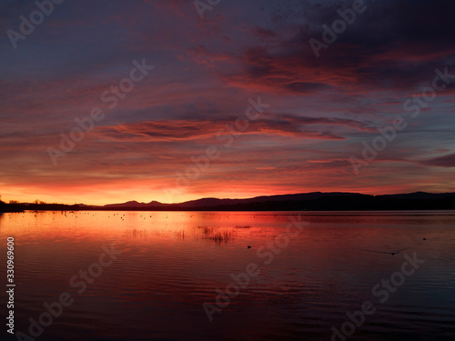 Beautiful sunset at the Murten Lake in Switzerland. © DK Photography